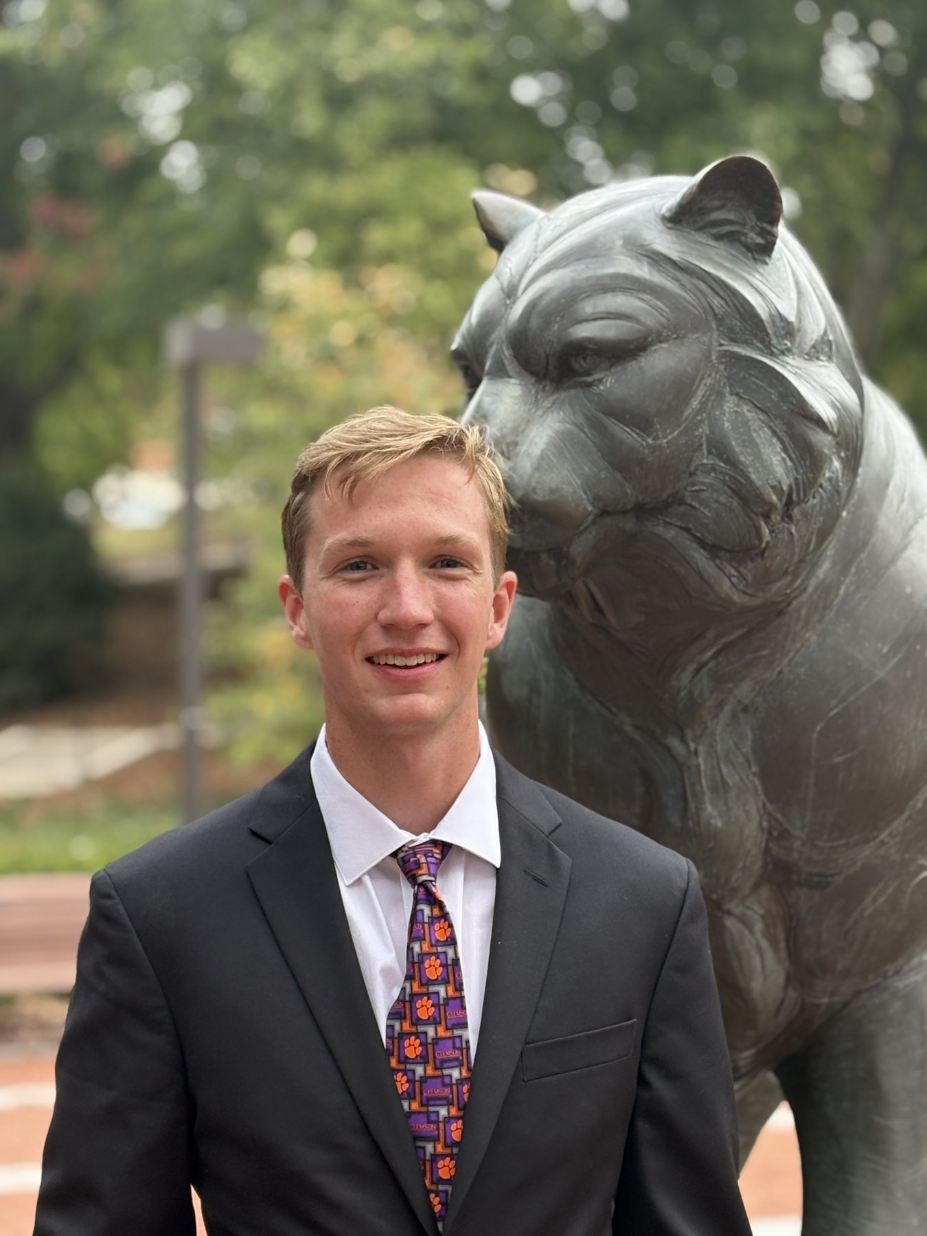 Alex in Clemson academic regalia